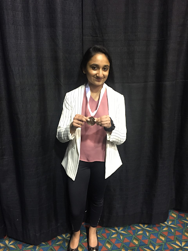 Tanya Manoj (21) with third place medal.