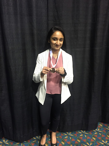 Tanya Manoj ('21) with third place medal.