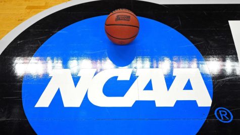 Mar 16, 2018; Charlotte, NC, USA; A view of the NCAA logo and basketball before the game between the Virginia Cavaliers and the UMBC Retrievers in the first round of the 2018 NCAA Tournament at Spectrum Center. Mandatory Credit: Bob Donnan-USA TODAY Sports
