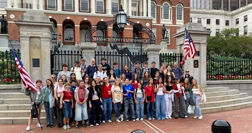 Exchange students from Switzerland stayed with host families in Reading and visited sites like the State House.