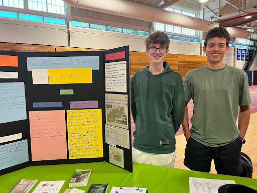 Students manning the Environmental Club exhibit at the RMHS Activity Fair.