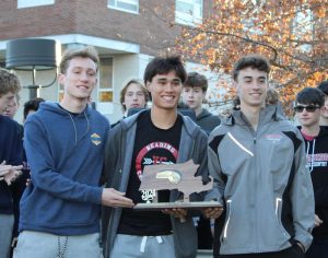 Boys Cross Country Captains with the D1C championship trophy.